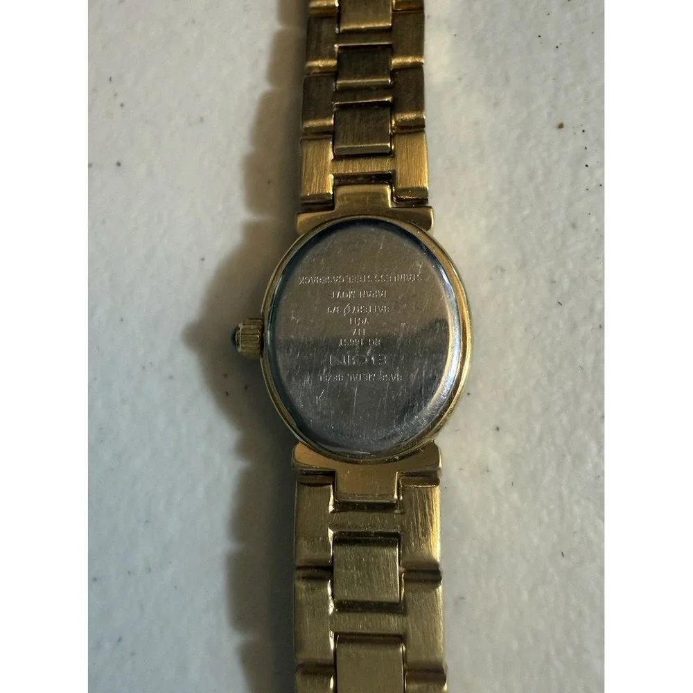 Elgin Women's Gold Tone Oval Quartz Watch White Dial Rhinestone Bezel